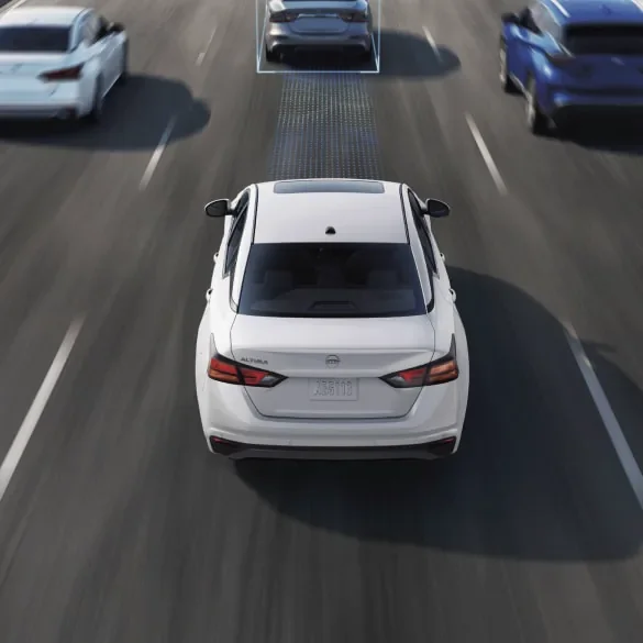 2027 Nissan Altima on freeway surrounded by cars with schematic drawings of ProPILOT Assist capabilities at Holler Nissan Columbia in Columbia SC